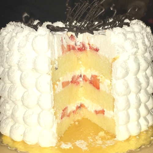 Buttercake with strawberry and whipped cream filling